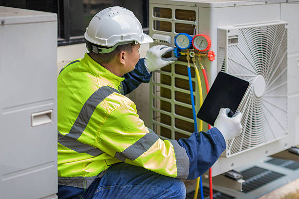 Professional Hvac technician working in Aston, PA